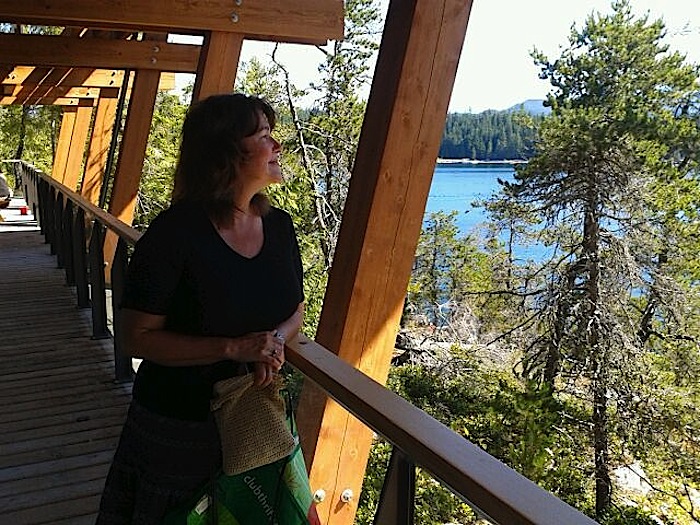 Kathi Camileri looking out from Klahoose New Relationship Building on Cortes Island – Roy L Hales photo
