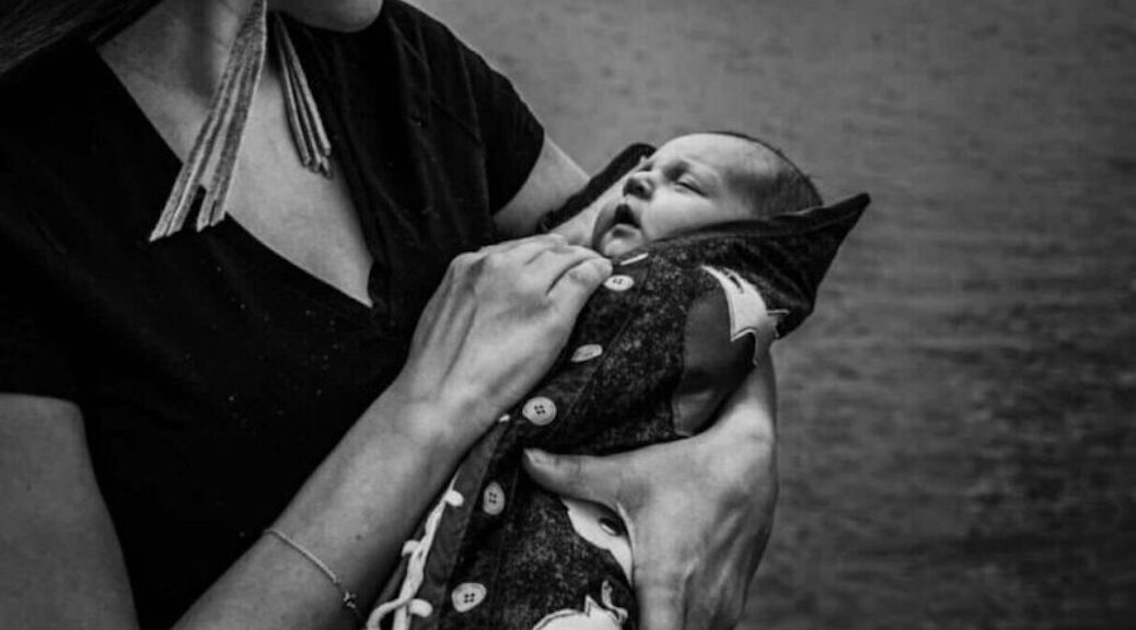 IndigiNews reporter Anna McKenzie with her baby.