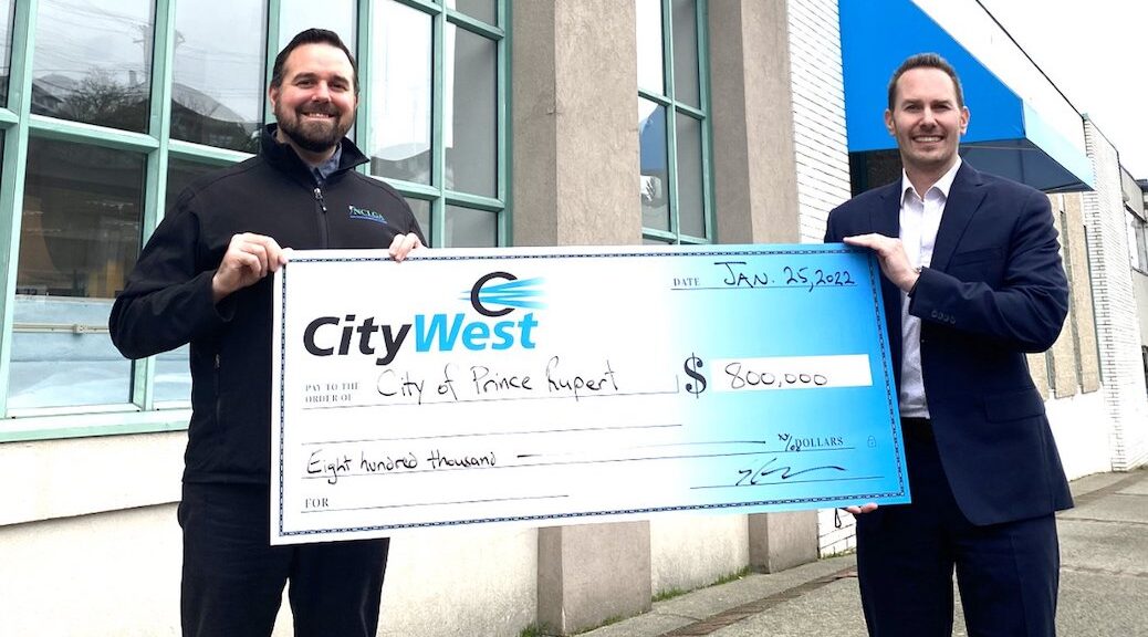 Two men with a huge cheque