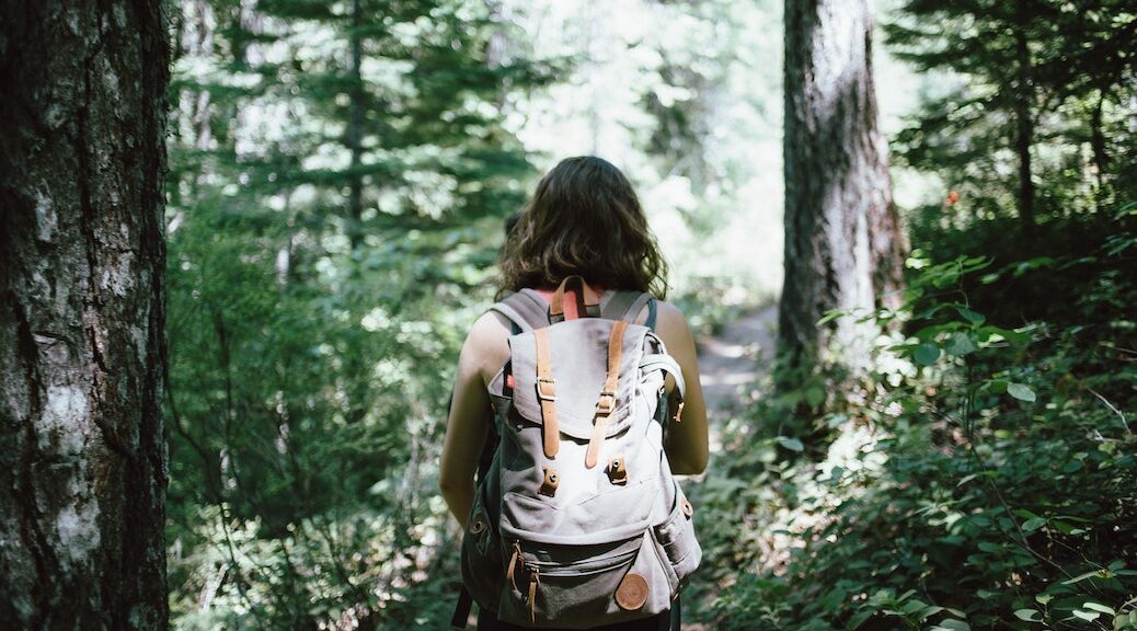Girl hiking in a forest