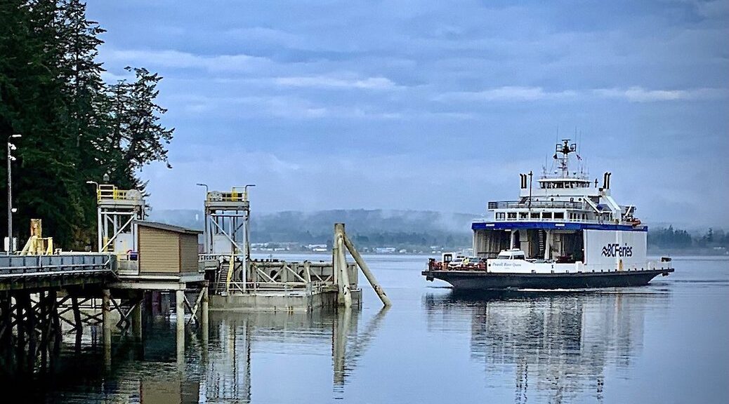 The Quadra Island ferry pulling up to the dock at Quathiaski Cove