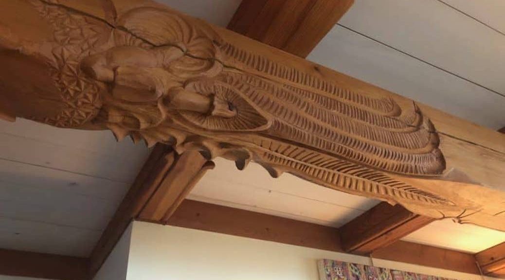 A beam featuring a Cortes Island artist’s carving in Carrie Saxifrage’s home.