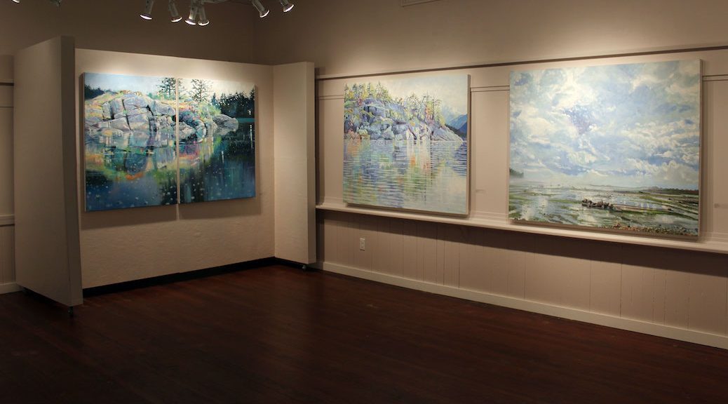 Three paintings walls displayed on the walls