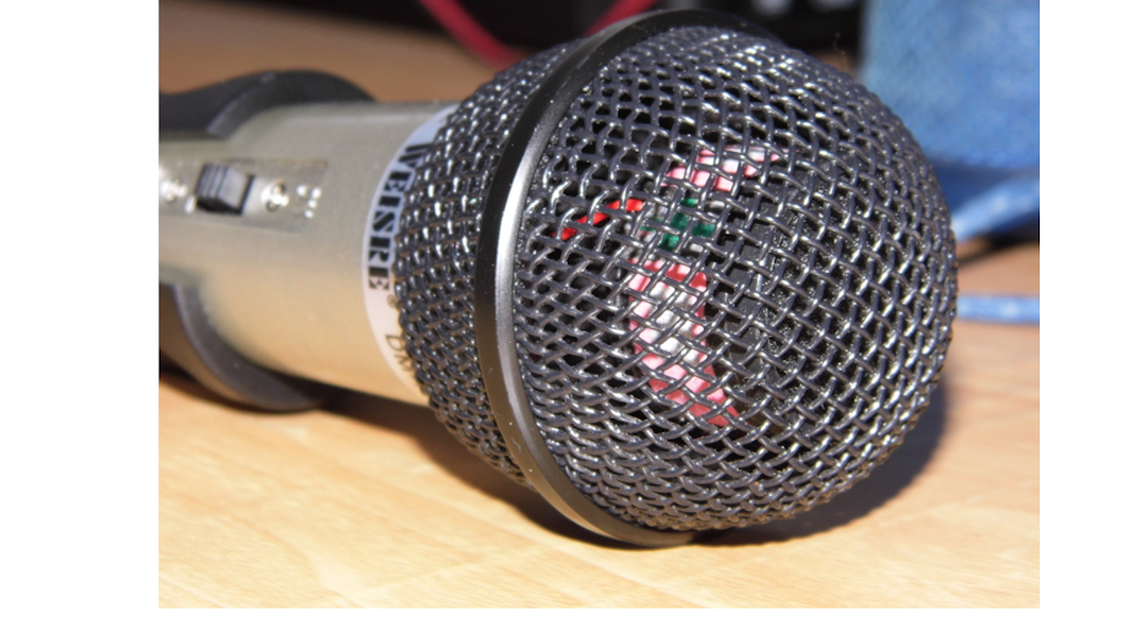 A Dynamic-XLR Microphone lying on a table top