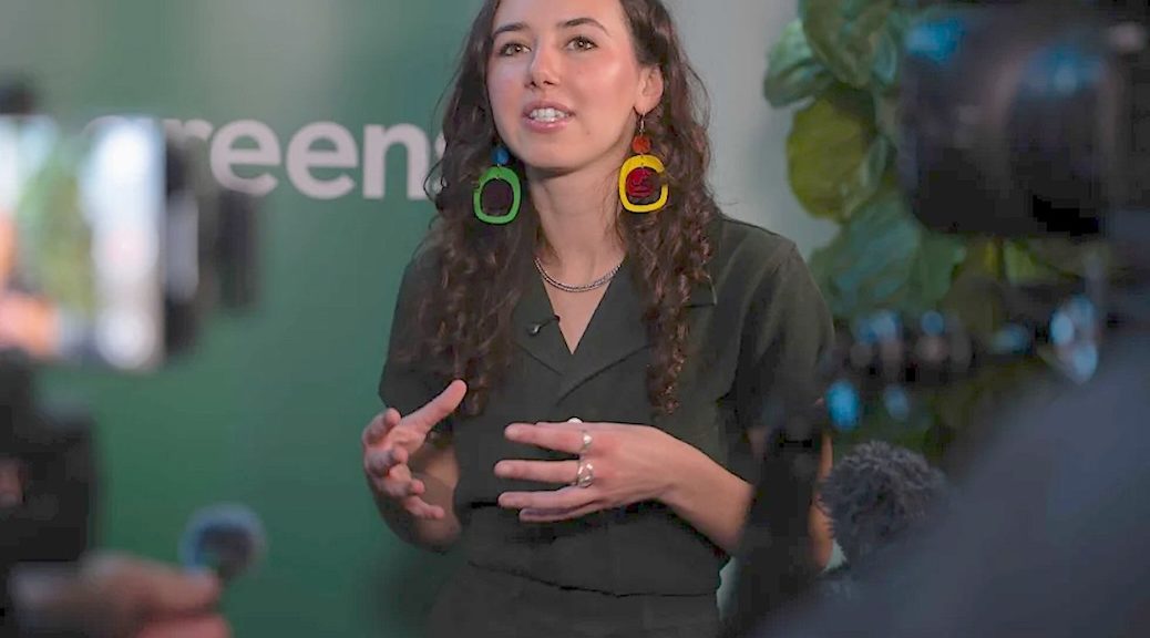 Young woman with her hands groping for something