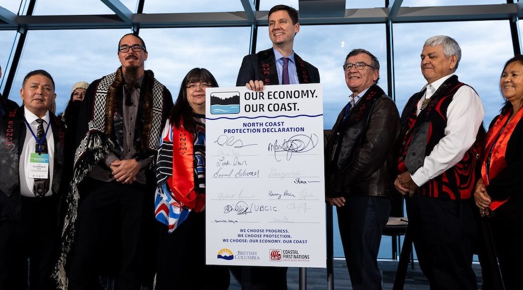 A group of INdigenous leaders with the premiere of BC behind signed agreement