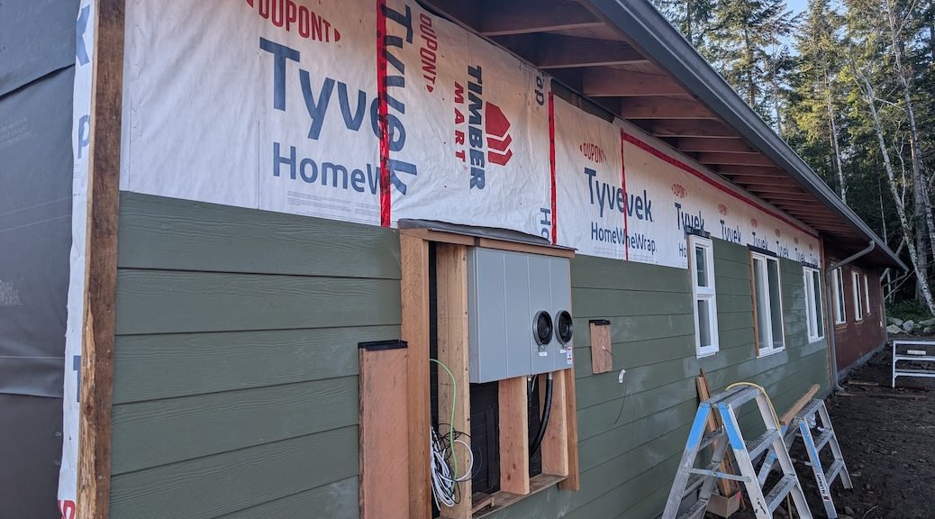 Siding going up on a new house