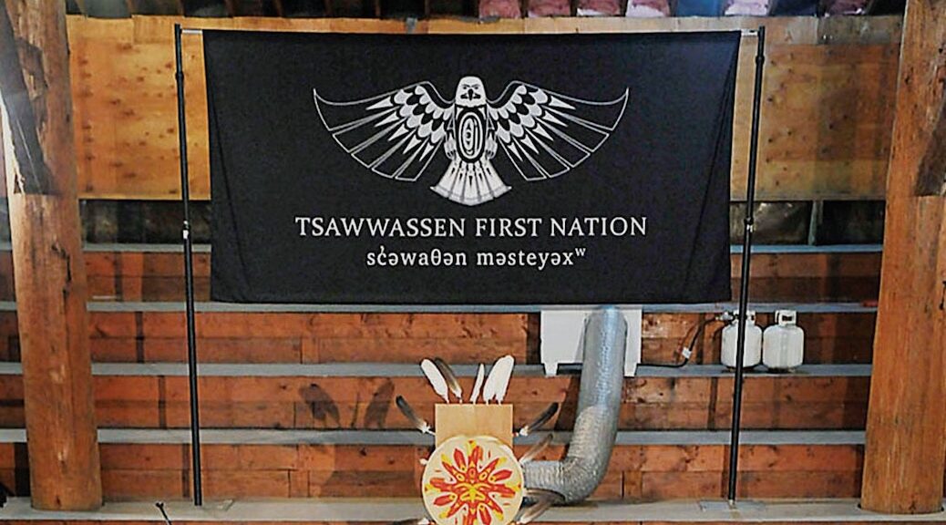 Tsawwassen First Nation banner on a log wall