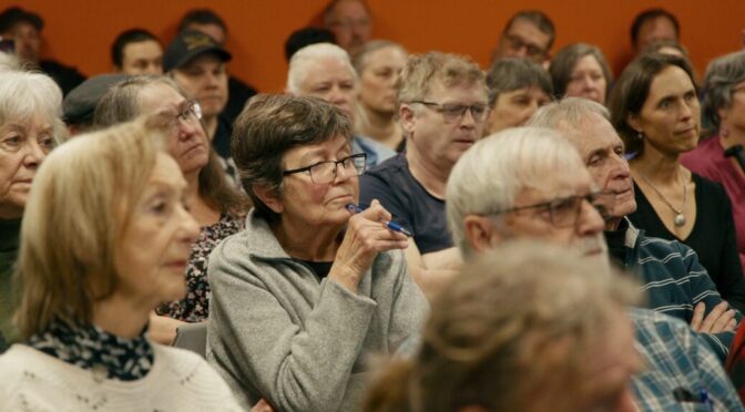 A crowd of concerned faces
