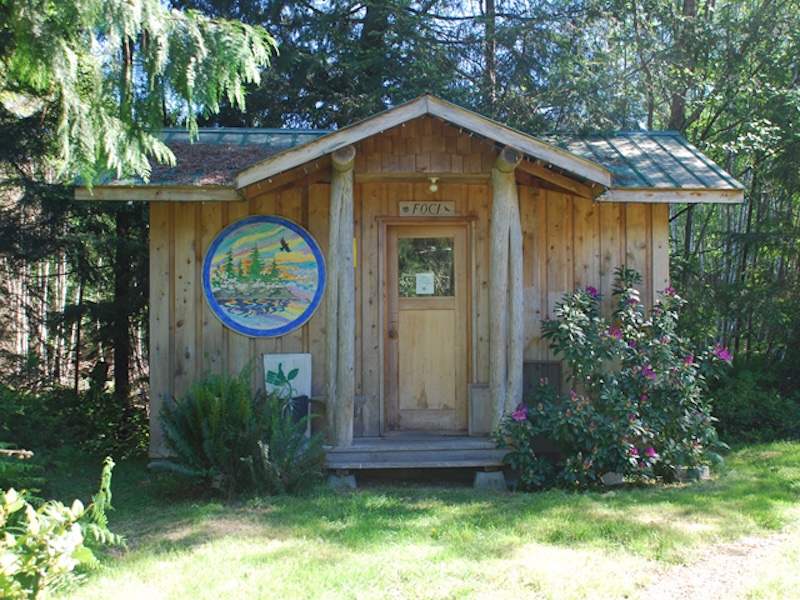 A small building with a FOCI sign